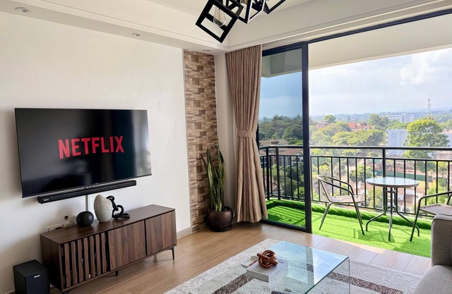 Luxurious 2BR Retreat with King Bed, Stunning Views, Pool, Gym & Self Check-In