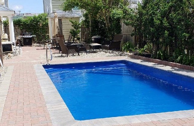 Luxurious 6 Bedroom Oceanside Home with Pool. Steps from the Beach.