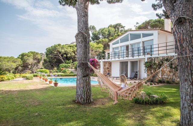 Luxurious Mediterranean villa in front of the sea overlooking the bay of Sant Pol.