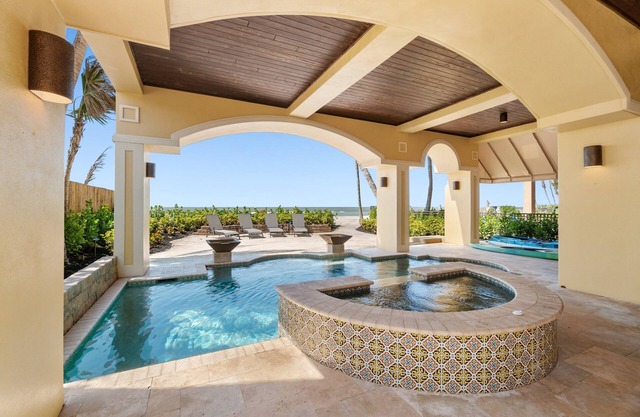 Luxury Beachfront Vacation Getaway on Bonita Beach | Sleeps 12