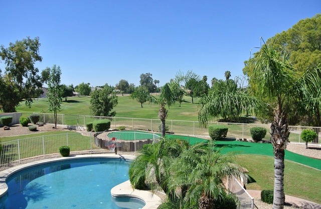 Luxury Living at it's Finest with Heated Pool, Hot Tub and Putting Green