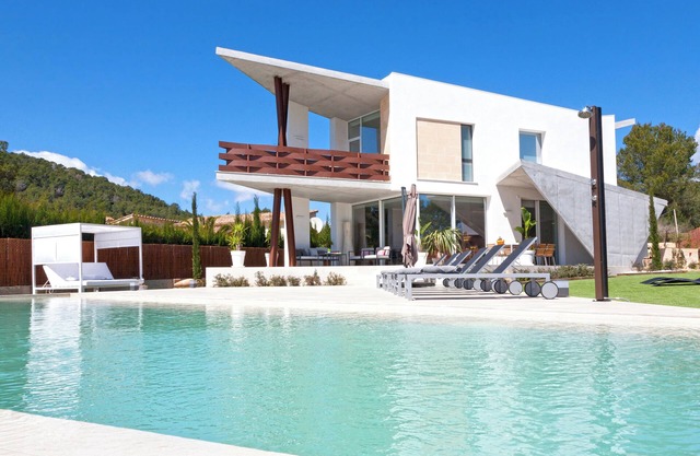 Luxury modern style villa with garden and heated pool
