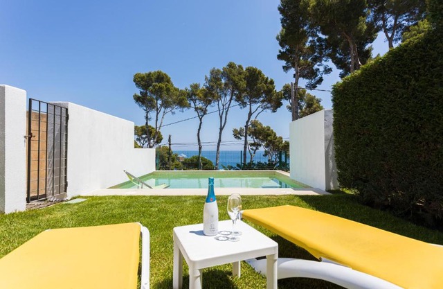 Luxury villa in front of the beach ONA
