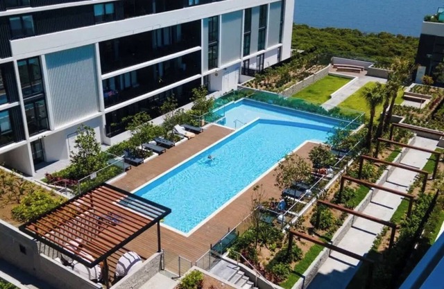 Luxury Woolooware Apartment with Private Balcony, Bay Views & Resort Perks