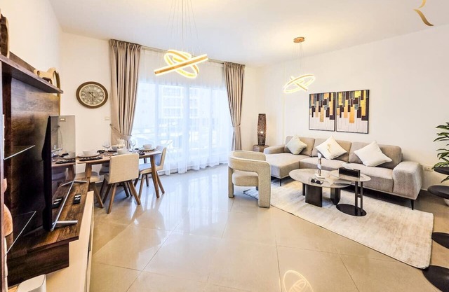 Luxxury 1BR Escape | Pool, Gym, Parking | Al Reef