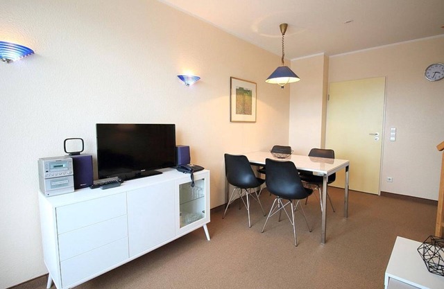 Maisonette vacation apartment on the North Sea with balcony and direct beach access -