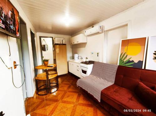 Microcasa com vista para o Cristo