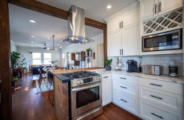 mid-century bungalow + private retro studio with outdoor hot tub