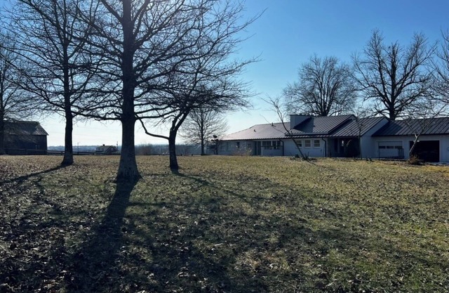 Midcentury 3-bedroom farmhouse on the city line between Danville and Stanford.