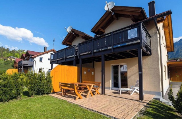 Modern chalet near the slopes with a ski storage