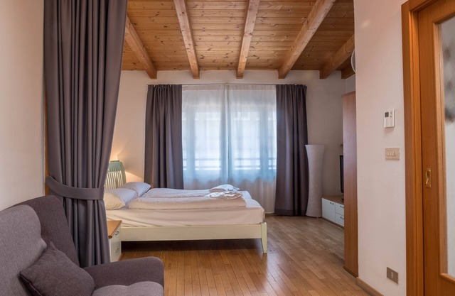 Modern Holiday Attic "5. Piano - Bolzano" with Wi-Fi and Air Conditioning