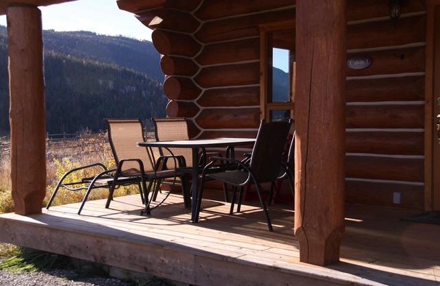 modern log cabin in untouched nature on a private lake