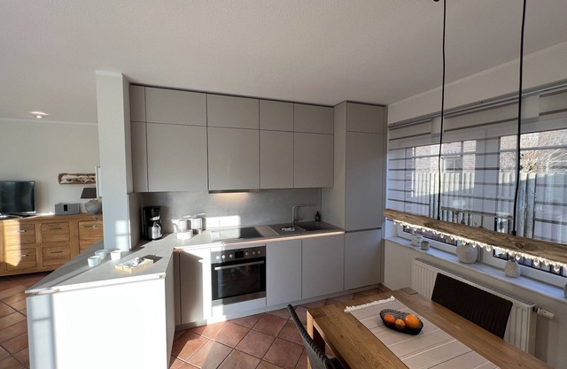 Modern, luxury holiday home with a large garden and terrace near the beach.