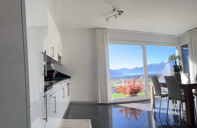 Modern one-bedroom apartment quiet area between lake and mountains