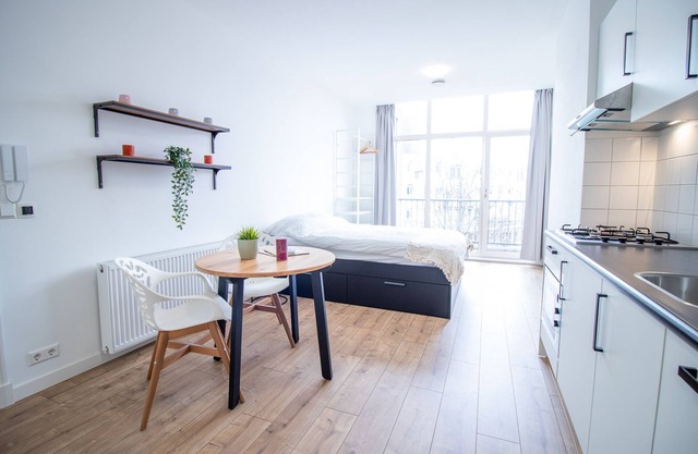 Modern studio with a balcony