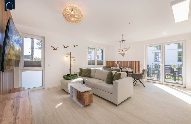 Modern vacation apartment with balcony, close to the beach in a quiet location