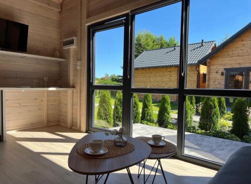 MOJA DEBINA LUX 1, domek z pokojem dziennym, jedną sypialnią i antresolą, blisko plaży