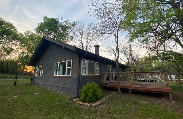 Monkey Island Escape sleeps 8, surrounded by nature with views of Grand Lake.