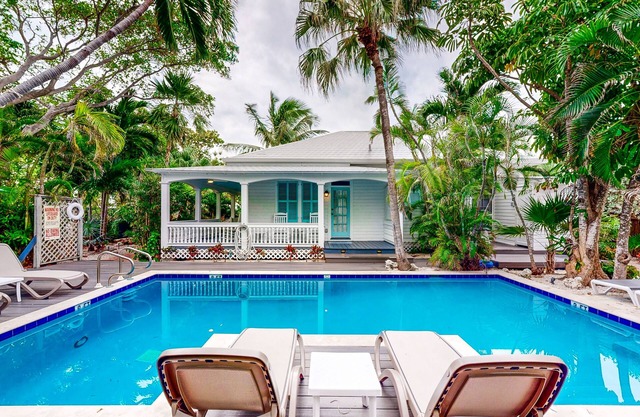 Multi-home tropical paradise with large, heated pool, & wraparound sundeck