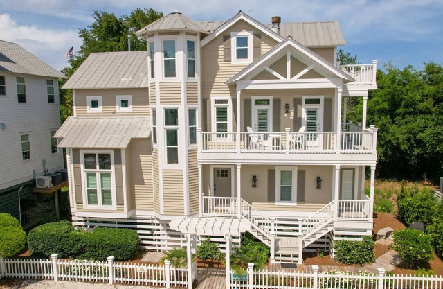 Multi Story home in seaside development with community pool and direct beach access.