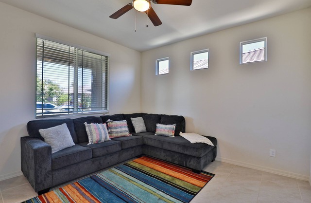 New 4 BR home with garage, pool, play area, splash pads, fenced backyard