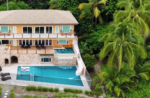 NEW CASTLE HOME ON THE BEACH,2 Pools,WATERSLIDE & WATERFALL!Includes Housekeepin