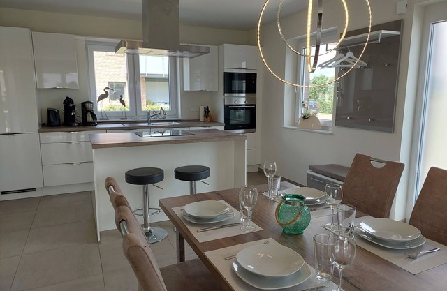 NEW! modern, high-quality, central apartment, sauna, garden, wallbox in Burhave