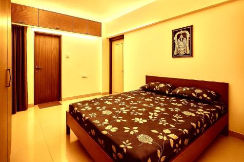 New Spacious 2BHK apartments in Tirupati Near Railway Station with fully equipped kitchen, AC bedrooms, Washing Machine, 24 hours water, caretaker service, and ample space for car parking & ideal for families and pilgrims