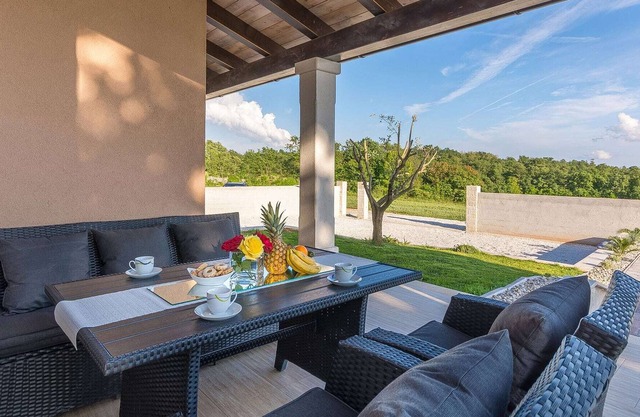 Newly built holiday house with pool and garden ,on a quiet location near Tinjan