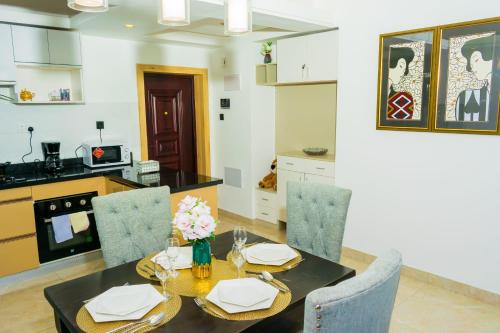 newly furnished two bedroom apartment with swimming pool, fully equipped gym, private parking space, children playground and unbeatable scenic city views in lavington