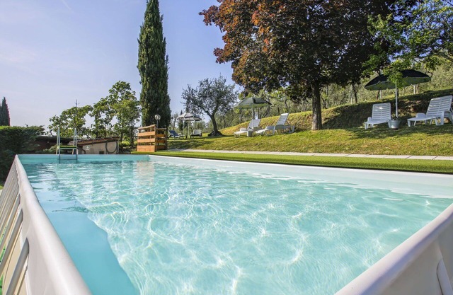 Nice apartment in villa for 3 guests with pool, WIFI, TV, patio and parking