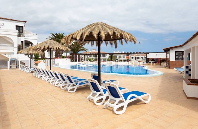 Nice apartment to the side golf course with pool, internet, TV in many languages