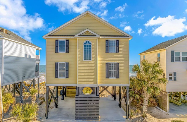 Oceanfront 6 bedroom house with heated pool right on beautiful Garden City Beach