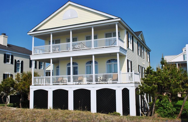 Oceanfront Beach Home with pool access located within Charlestowne Grant community.
