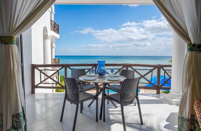 Oceanfront Condo with Artful Décor, Pool & Balconies