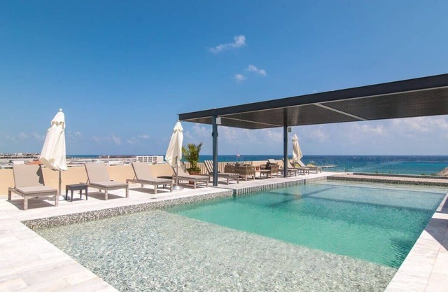 Oceanview Pools & Rooftop Lounge, Steps to Beach
