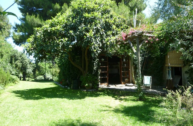 Old barn surrounded by greenery a few meters from the sea in le ripe estate