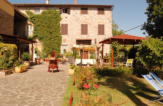 Old stone farmhouse near Lucca, Tuscany.