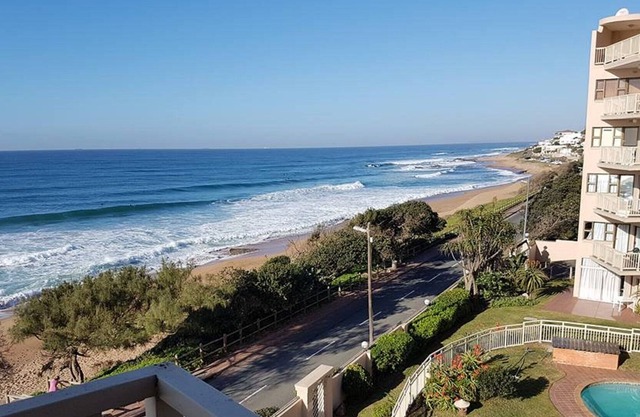 On the beach, your happy place!