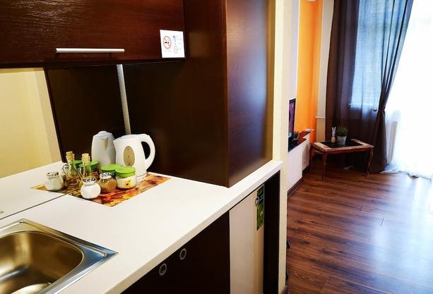 Orange studio with balcony