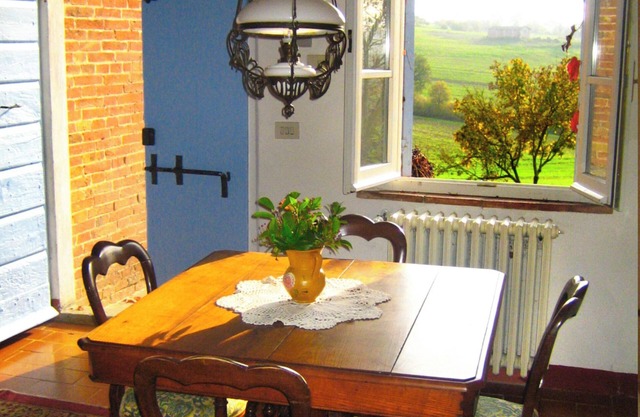 Panoramic apartment in old farmhouse. Farm with historic wine cellar.