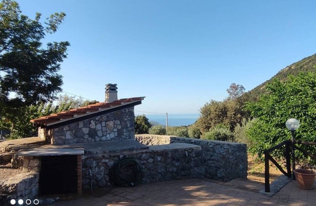 Panoramic hillside house with sea view