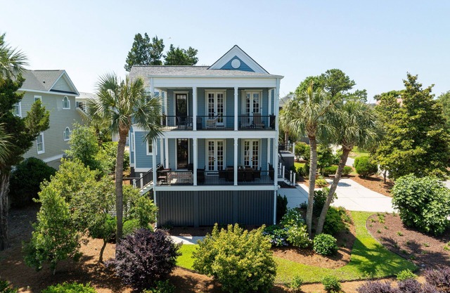 Pet-Friendly Wild Dunes Stay – Pool Access + Porches & Classic Coastal Style