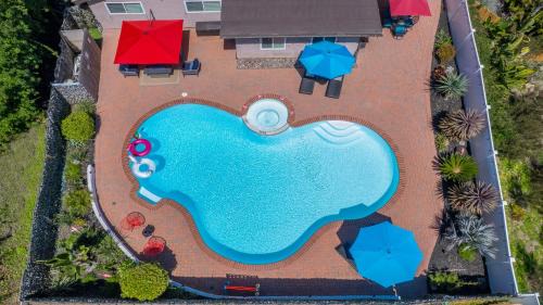 Poolside Retreat with Spa, Game Room, and Mini Golf