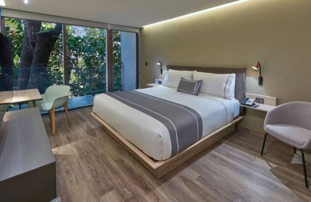Prime Location in Trendy Zone – Modern Room, Work Desk, and Local Charm