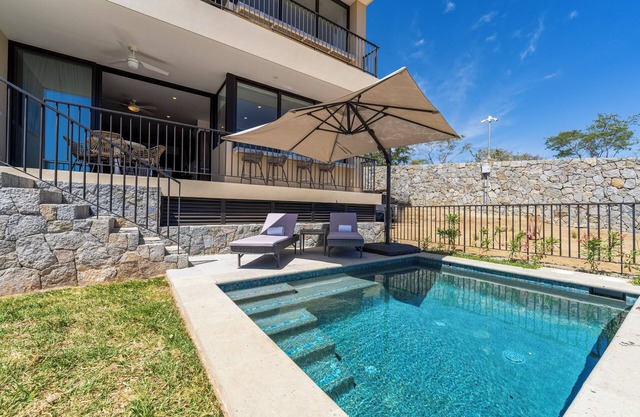 Private and heated pool with arch view new condo!n