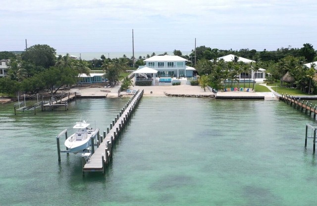 Private Beach Bayside 6 Bedroom Resort Home with Pool, Dock, & Garage