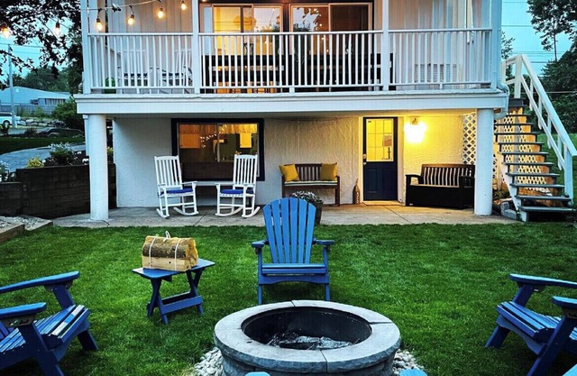 Private beach; firepit, outdoor shower, AC, two kitchens, laundry, covered patio