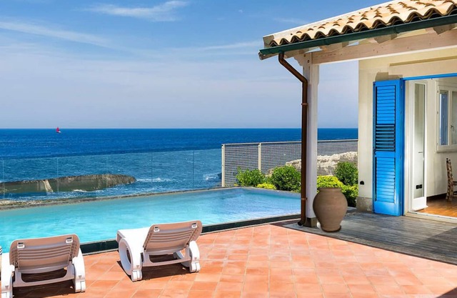 Private seafront villa with swimming pool