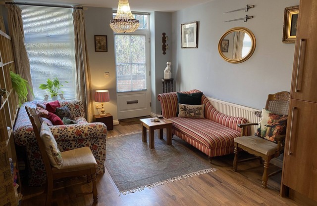 Quirky town centre apartment with river terrace